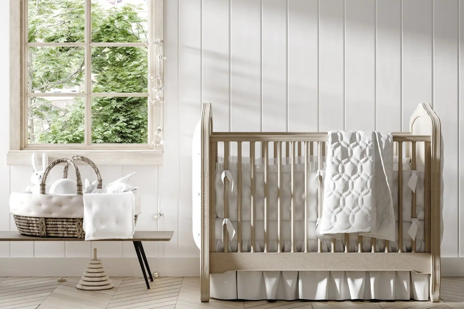 Nursery room with a Isabella Cot, basket, and window with natural light designed by Baby Belle