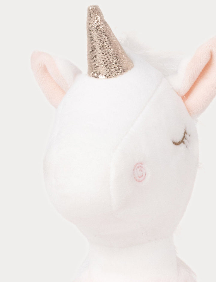 Ballerina Unicorn Ella plush toy with pink tutu and gold horn close up