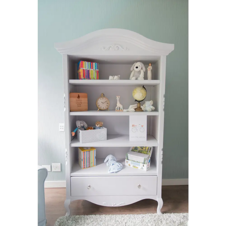 Hand-crafted Auriga Bookshelf - Handcrafted white nursery bookshelf with arched crown and carved detailing, part of the Baby Belle furniture collection