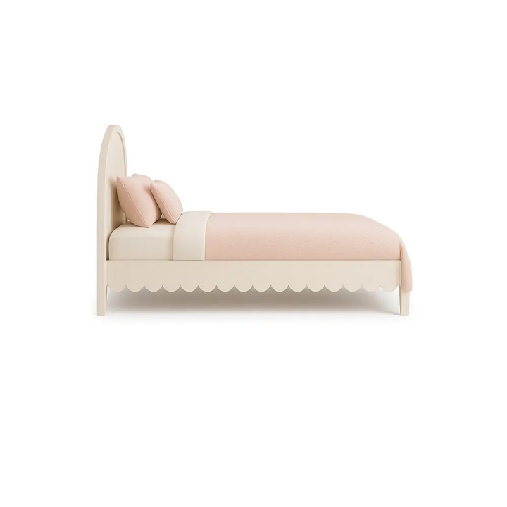 The Fleur Bed side view – elegant kids bed with arched headboard and scalloped side rails, finished in soft neutral tones by Baby Belle Kids Furniture