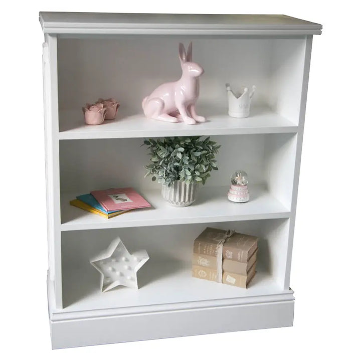 White hand-painted Rene bookshelf with three fixed open shelves, low profile design for toddlers or children’s rooms
