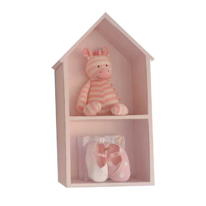 Medium Isabella house-shaped wall shelf in soft pink, styled with plush toy and baby shoes, ideal for a nursery or toddler’s room
