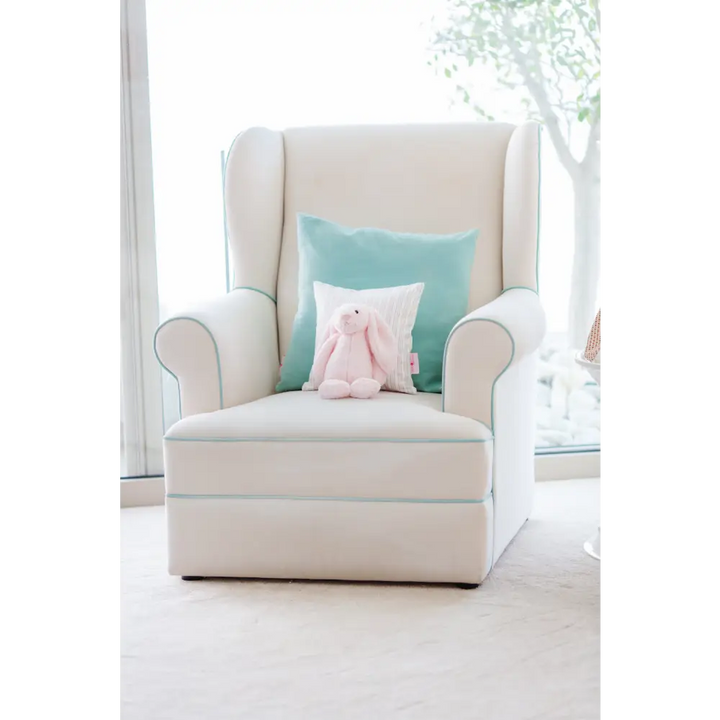 Baby Belle Entree Feeding Chair in cream fabric with aqua piping, classic wingback design, wide seat, and optional glider base – handcrafted luxury nursing and feeding chair South Africa