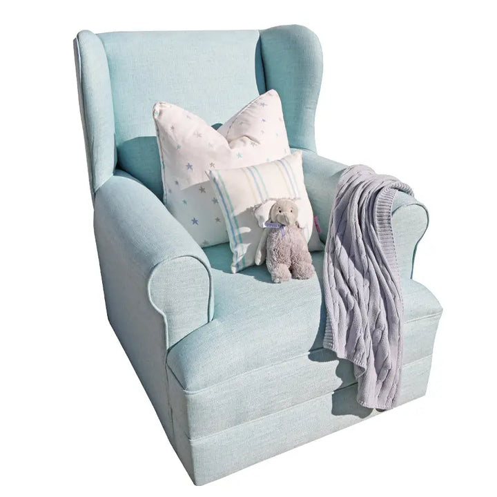 Baby Belle Entree Feeding Chair in light blue fabric with classic wingback design, extra-wide seat, and optional glider base – luxury nursing and feeding chair handcrafted in South Africa
