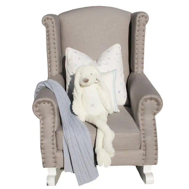 Baby Belle Romeo Rocking Chair in grey fabric with stud detailing and white painted wooden rocking legs, classic wingback nursing and feeding chair handcrafted in South Africa.