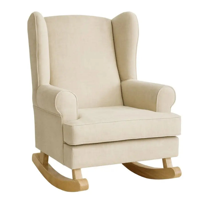 The Baby Belle Valentina Rocking Chair in a classic wingback design with natural oak rocking legs, upholstered in neutral fabric — a timeless and elegant nursery chair